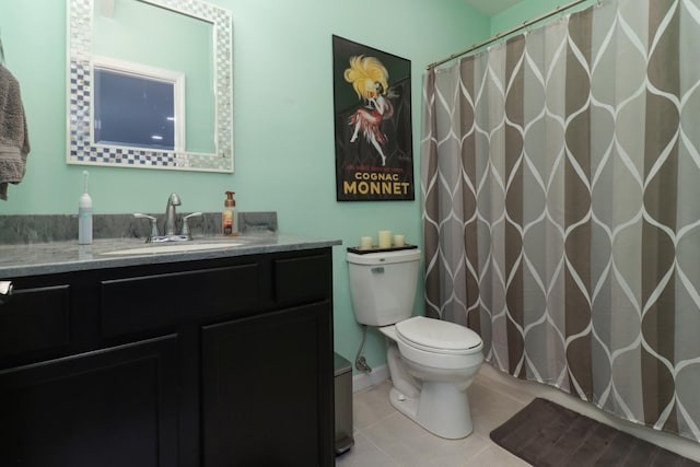 full bath featuring tile patterned floors, toilet, curtained shower, and vanity