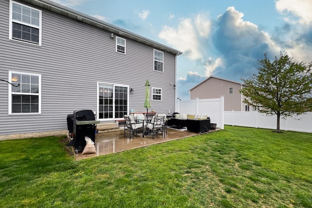 rear view of house with a yard, fence, an outdoor hangout area, and a patio area