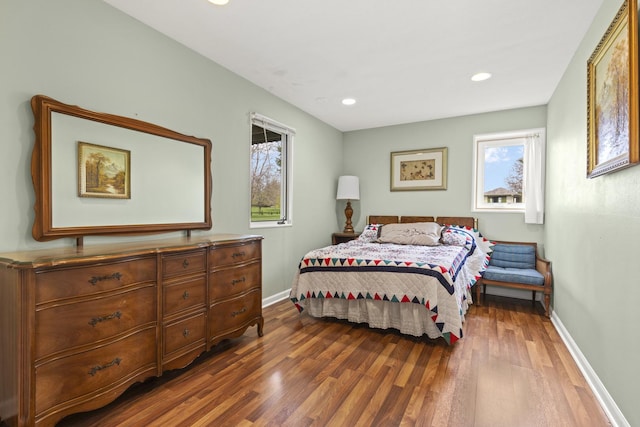 11920 Hunterston Dr, Caledonia, IL 61011 - bedroom featuring recessed lighting, baseboards, multiple windows, and wood finished floors