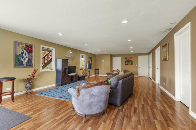 11920 Hunterston Dr, Caledonia, IL 61011 - living room featuring recessed lighting, baseboards, and wood finished floors