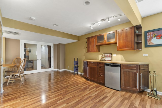 11920 Hunterston Dr, Caledonia, IL 61011 - kitchen with fridge, french doors, light countertops, baseboards, and light wood-style floors