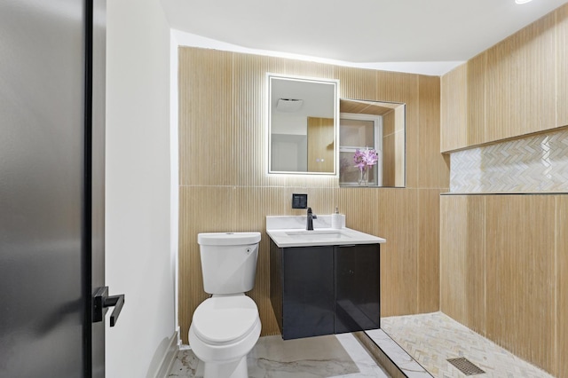 6430 S Eberhart Ave, Chicago, IL 60637 - full bath with toilet, vanity, marble finish flooring, a shower, and tile walls