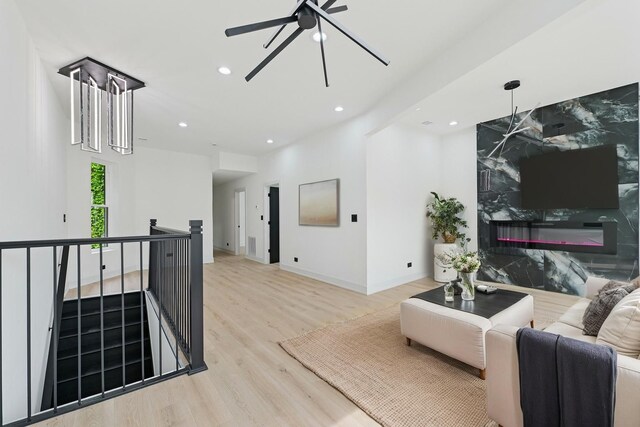 6430 S Eberhart Ave, Chicago, IL 60637 - unfurnished room with a premium fireplace, wood finished floors, recessed lighting, ceiling fan, and baseboards