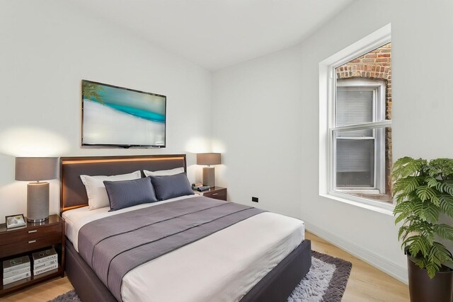 6430 S Eberhart Ave, Chicago, IL 60637 - spare room featuring wood finished floors and baseboards