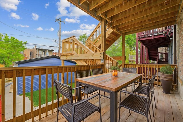 6430 S Eberhart Ave, Chicago, IL 60637 - wooden deck featuring stairway and a yard