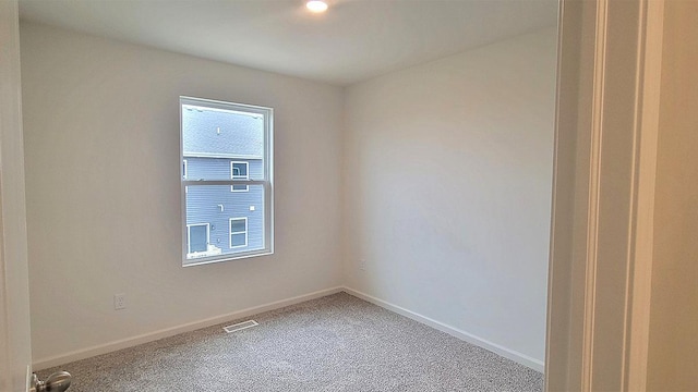 6600 Linden Trl Unit F, Wonder Lake, IL 60097 - carpeted empty room with baseboards and visible vents