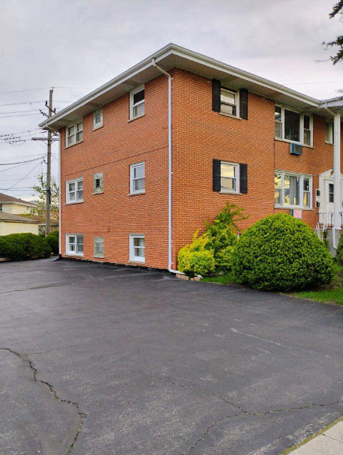 8856 Plainfield Rd, Brookfield, IL 60513 - view of property exterior featuring brick siding