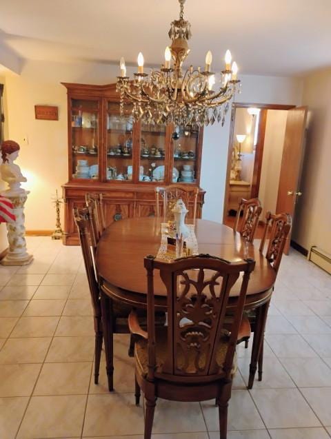 8856 Plainfield Rd, Brookfield, IL 60513 - dining room with an inviting chandelier, baseboards, and light tile patterned floors