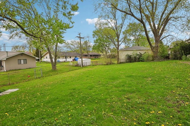 view of yard with fence