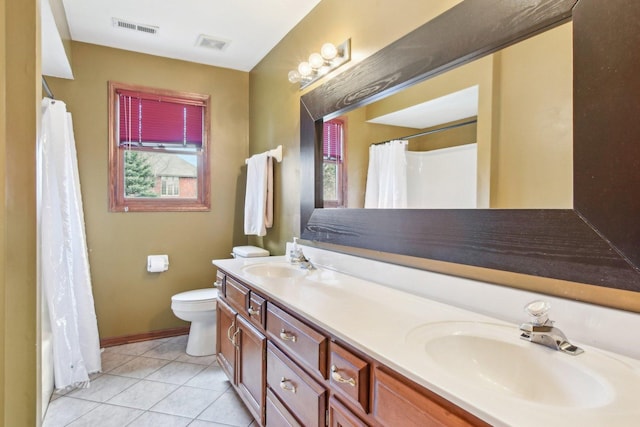 full bathroom featuring a sink, toilet, and visible vents