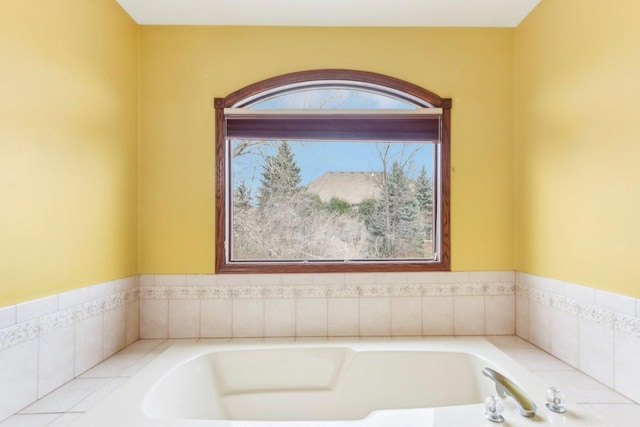 full bathroom with a garden tub