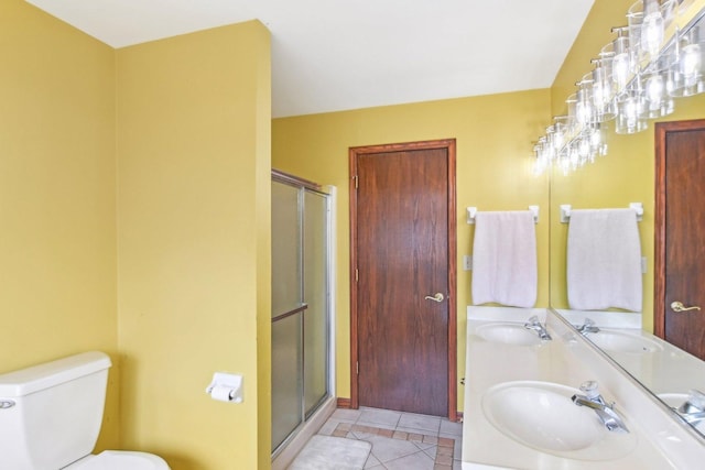full bath featuring a sink and a shower stall
