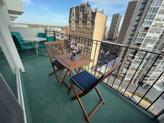 balcony featuring a view of city
