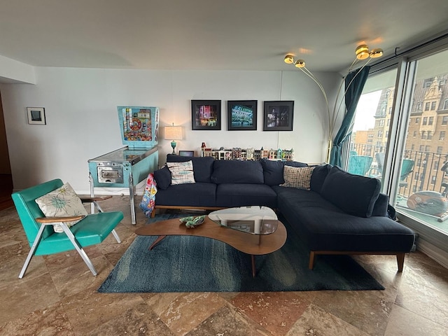 living area with stone finish floor