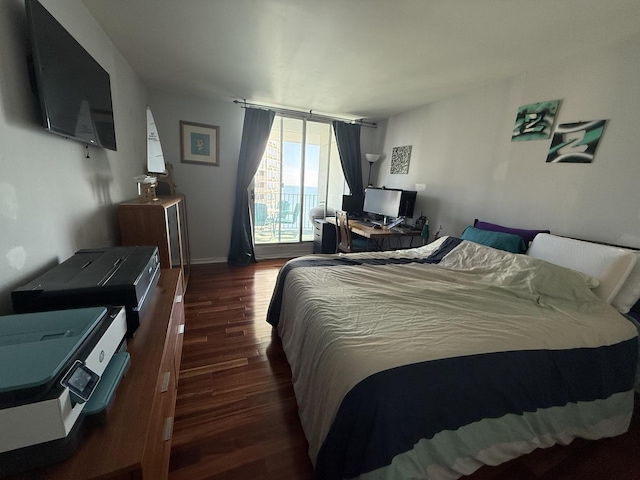 6033 N Sheridan Rd Unit 12B, Chicago, IL 60660 - bedroom with wood finished floors and baseboards