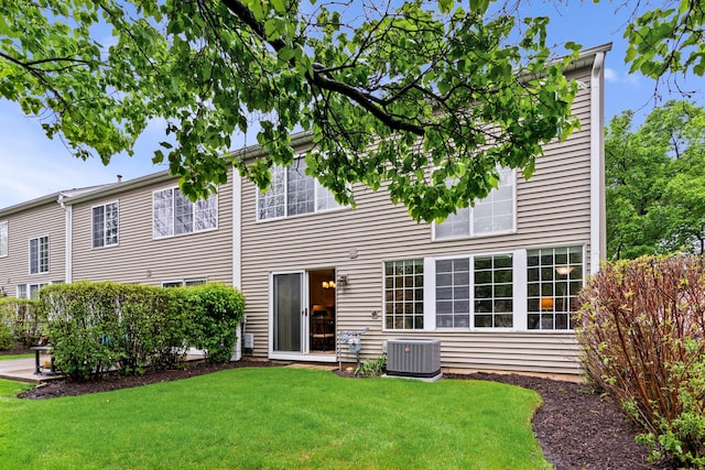 1277 Silk Oak Ln, Bartlett, IL 60103 - rear view of property with central AC unit and a yard