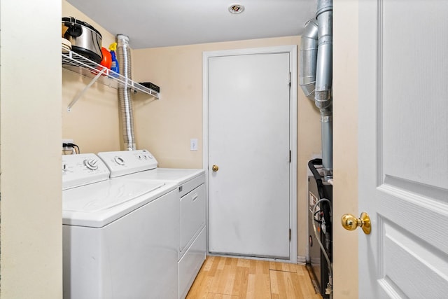 1277 Silk Oak Ln, Bartlett, IL 60103 - laundry area with washer and dryer and light wood-type flooring