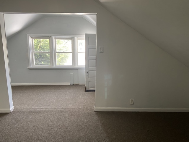 5014 W Strong St, Chicago, IL 60630 - additional living space featuring lofted ceiling, carpet flooring, and baseboards