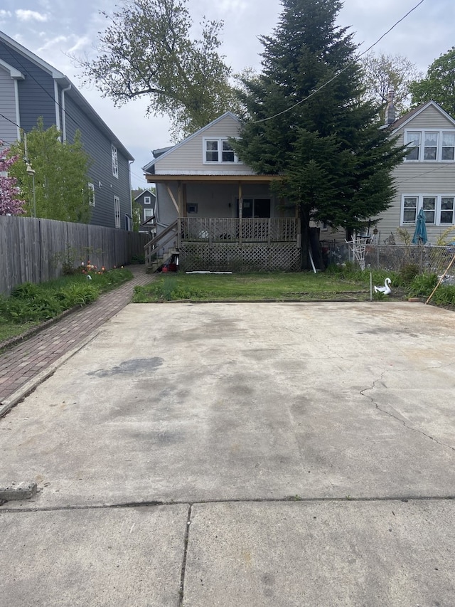 5014 W Strong St, Chicago, IL 60630 - view of front of home with covered porch and fence