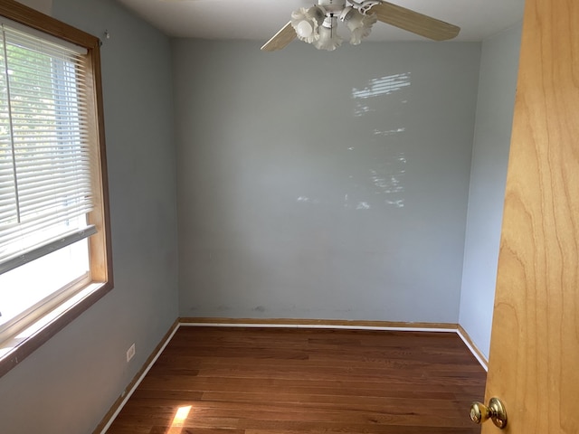 5014 W Strong St, Chicago, IL 60630 - unfurnished room featuring healthy amount of natural light, wood finished floors, ceiling fan, and baseboards