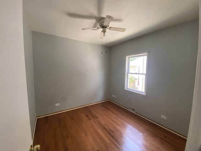5014 W Strong St, Chicago, IL 60630 - unfurnished room with a ceiling fan, wood finished floors, and baseboards