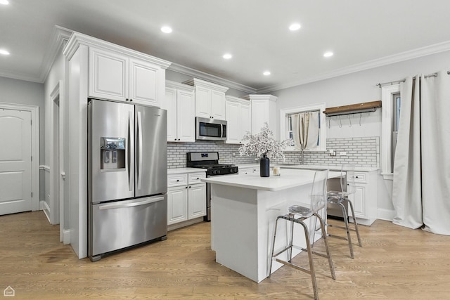 4843 N Harding Ave Unit 1N, Chicago, IL 60625 - kitchen featuring stainless steel appliances, open shelves, ornamental molding, white cabinetry, and tasteful backsplash