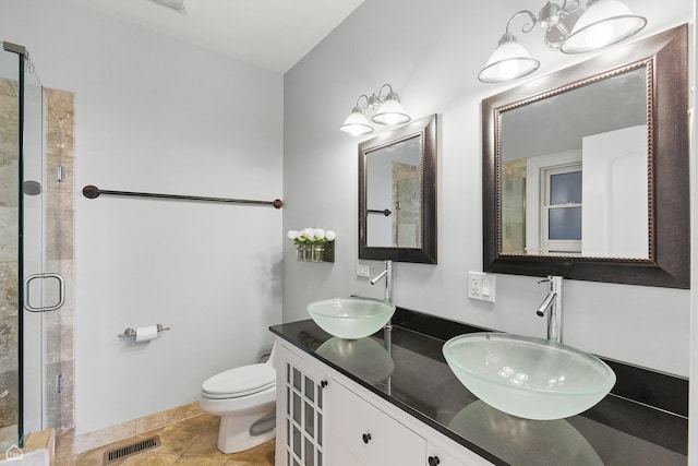 4843 N Harding Ave Unit 1N, Chicago, IL 60625 - full bath with a shower stall, double vanity, toilet, and tile patterned flooring