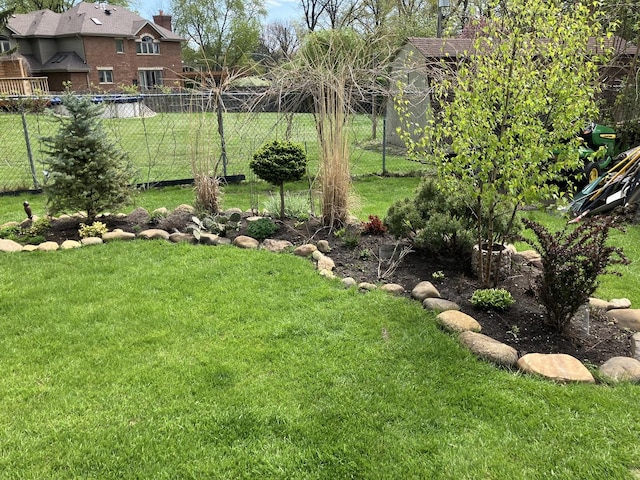 view of yard featuring fence