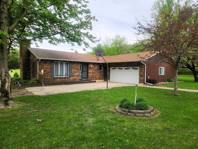 single story home with a garage, a chimney, concrete driveway, a front yard, and brick siding