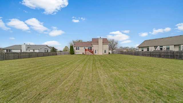 view of yard featuring a fenced backyard