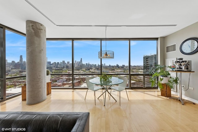 sunroom featuring a view of skyline