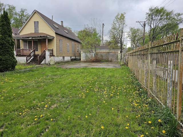 11920 S Calumet Ave, Chicago, IL 60628 - view of yard with covered porch and fence
