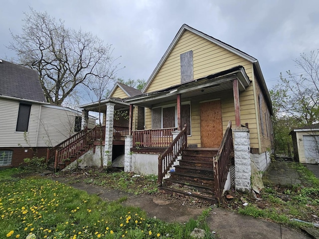 11920 S Calumet Ave, Chicago, IL 60628 - view of front of house with covered porch and stairs