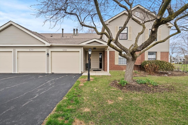 5177 Coventry Ln Unit D, Gurnee, IL 60031 - traditional home with brick siding and a front yard