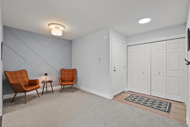 5177 Coventry Ln Unit D, Gurnee, IL 60031 - sitting room featuring baseboards and light carpet