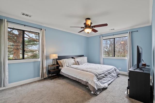 5177 Coventry Ln Unit D, Gurnee, IL 60031 - carpeted bedroom featuring baseboards, multiple windows, and visible vents