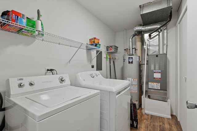 5177 Coventry Ln Unit D, Gurnee, IL 60031 - clothes washing area featuring wood finished floors, laundry area, washer and dryer, and gas water heater