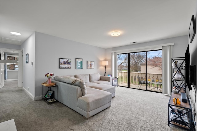 5177 Coventry Ln Unit D, Gurnee, IL 60031 - carpeted living room featuring baseboards and visible vents