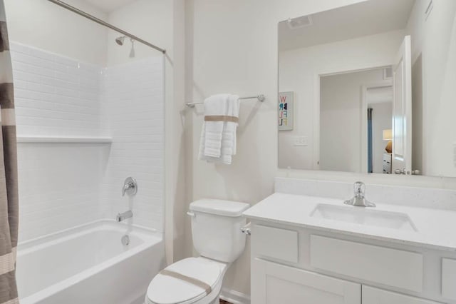 full bathroom with toilet, shower / tub combo with curtain, vanity, and visible vents