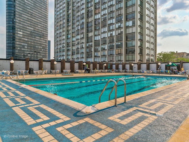 pool with a patio area