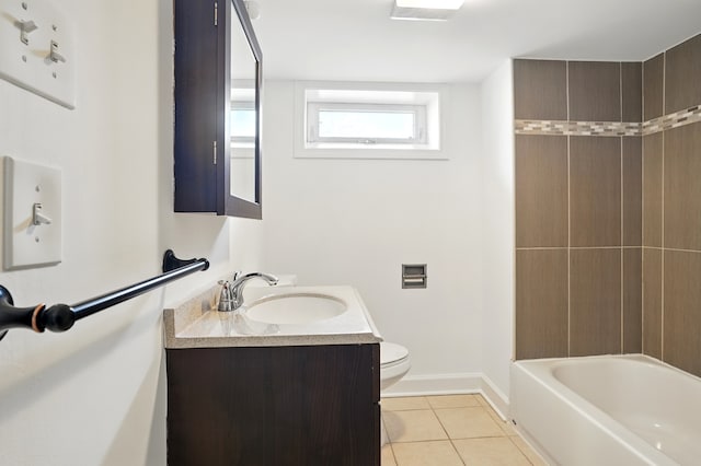 full bath featuring tile patterned floors, toilet, vanity, and baseboards