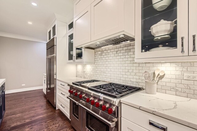 1955 N Halsted St Unit 1, Chicago, IL 60614 - kitchen with double oven range, a chandelier, white cabinetry, a sink, and dark wood-style flooring