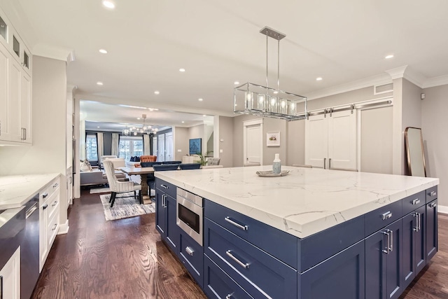1955 N Halsted St Unit 1, Chicago, IL 60614 - kitchen featuring a chandelier, appliances with stainless steel finishes, blue cabinets, open floor plan, and dark wood-style flooring