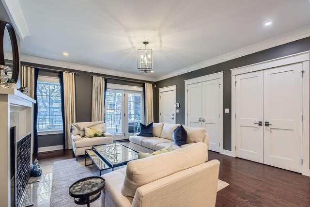 1955 N Halsted St Unit 1, Chicago, IL 60614 - living area featuring crown molding, wood finished floors, baseboards, a chandelier, and recessed lighting