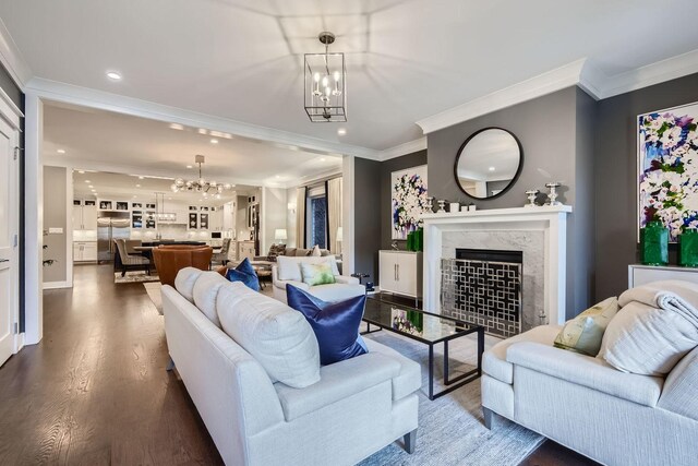 1955 N Halsted St Unit 1, Chicago, IL 60614 - living room with crown molding, plenty of natural light, baseboards, a fireplace, and dark wood finished floors