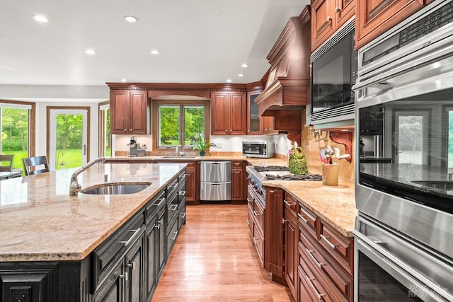 11 N Meadow Ct, South Barrington, IL 60010 - kitchen featuring a sink, appliances with stainless steel finishes, recessed lighting, light wood-style flooring, and a spacious island