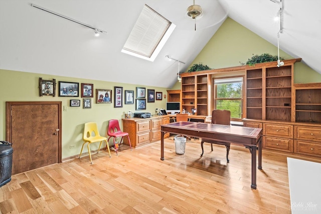 11 N Meadow Ct, South Barrington, IL 60010 - office area featuring rail lighting, light wood-type flooring, high vaulted ceiling, and a skylight