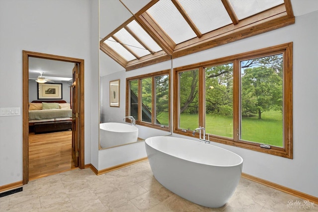 11 N Meadow Ct, South Barrington, IL 60010 - bathroom featuring a skylight, connected bathroom, baseboards, a freestanding bath, and beamed ceiling