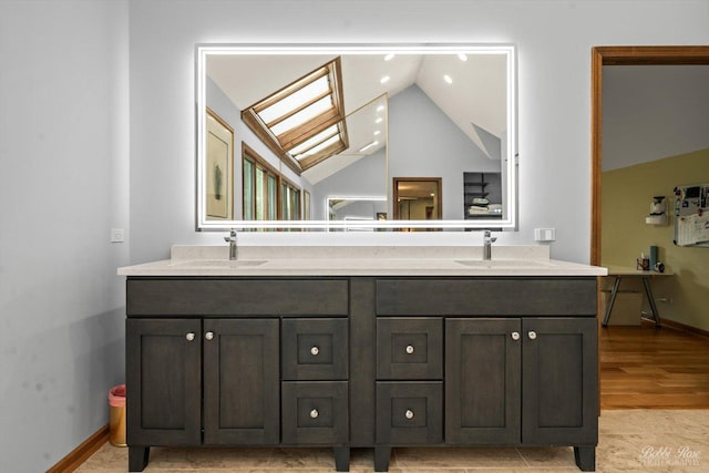 11 N Meadow Ct, South Barrington, IL 60010 - bathroom with vaulted ceiling, double vanity, baseboards, and wood finished floors