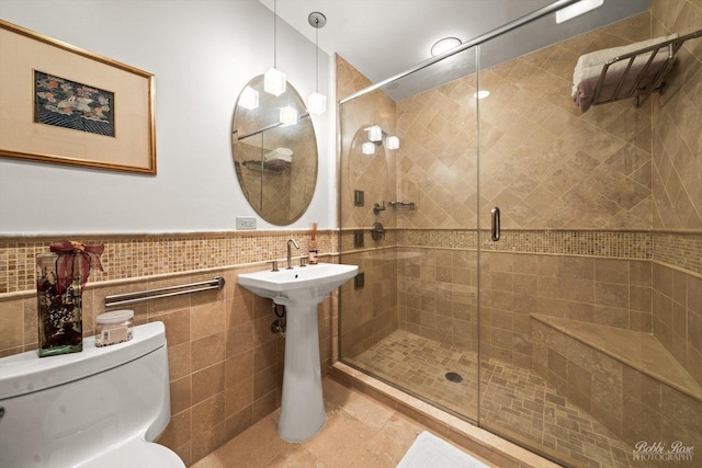 11 N Meadow Ct, South Barrington, IL 60010 - full bathroom with toilet, a stall shower, tile walls, a wainscoted wall, and tile patterned flooring